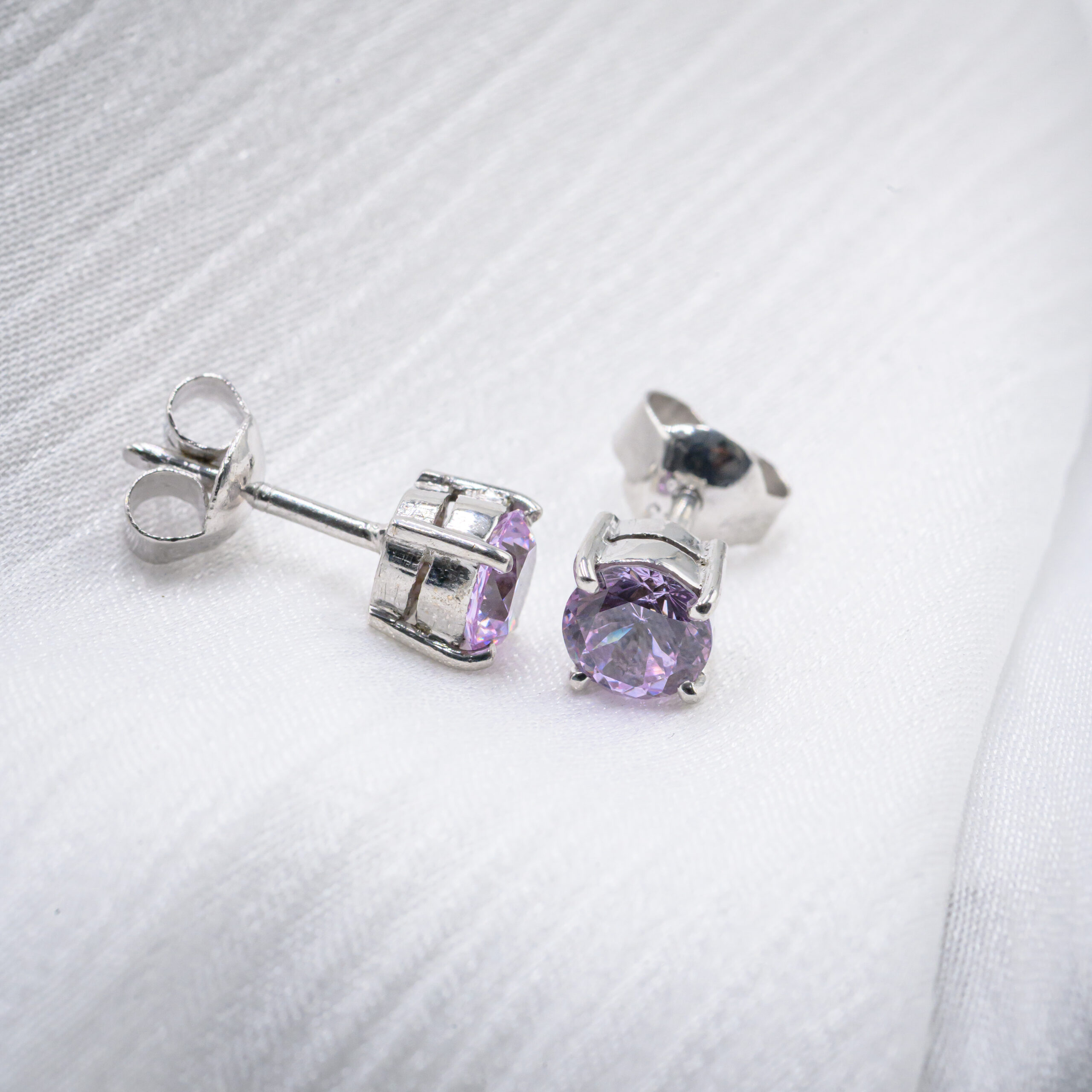 Lavender Glow Round-Cut Sapphire Stud Earrings in Sterling Silver