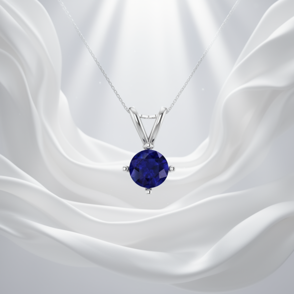 Royal Blue Sapphire Round Pendant in Rhodium-Plated Sterling Silver