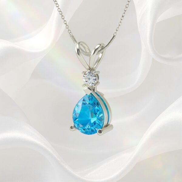 Ocean Halo Swiss Blue Topaz & Zircon Pear Pendant in Sterling Silver