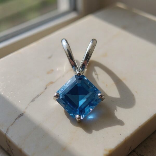 Arctic Glow Asscher-Cut Swiss Blue Topaz Pendant in Rhodium-Plated Sterling Silver