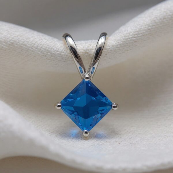 Arctic Glow Swiss Blue Topaz Princess Cut Pendant in Rhodium-Plated Sterling Silver